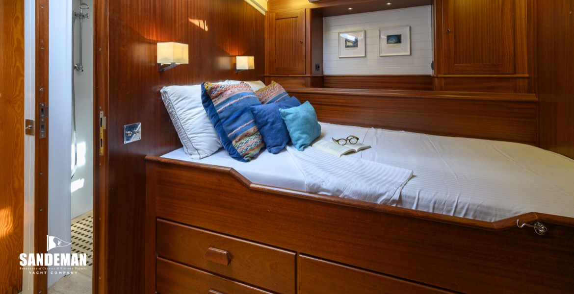FWD DOUBLE GUEST CABIN V AFT TO PORT AND HEAD