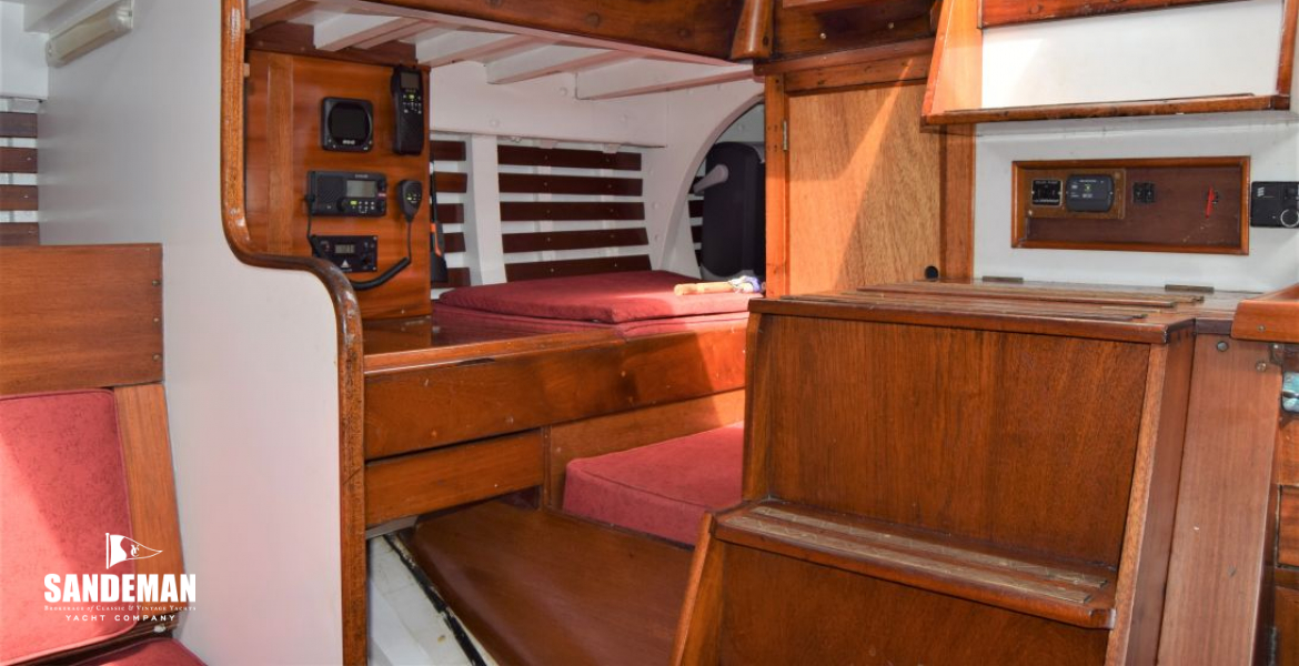 Saloon view aft to stbd - nav area and qtr berth