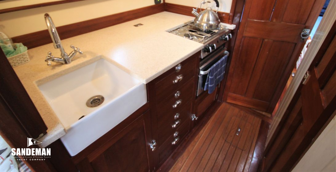 Galley fwd to port (WC to stbd)