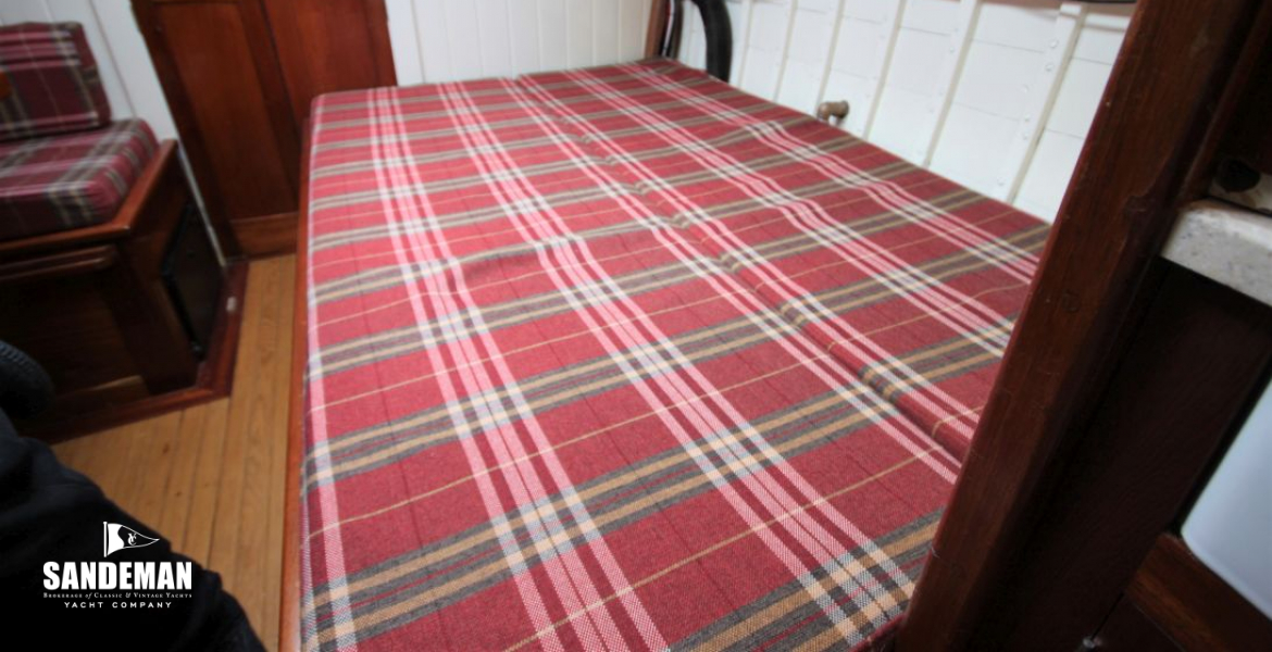 Port settee as double berth view aft