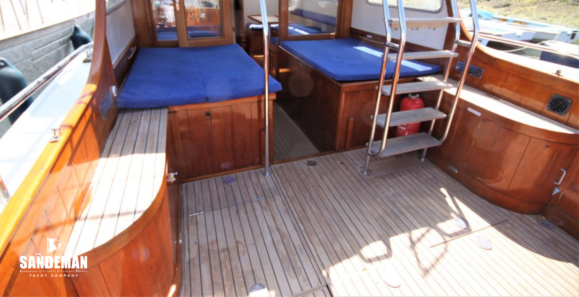 Aft deck view fwd; steps to flybridge