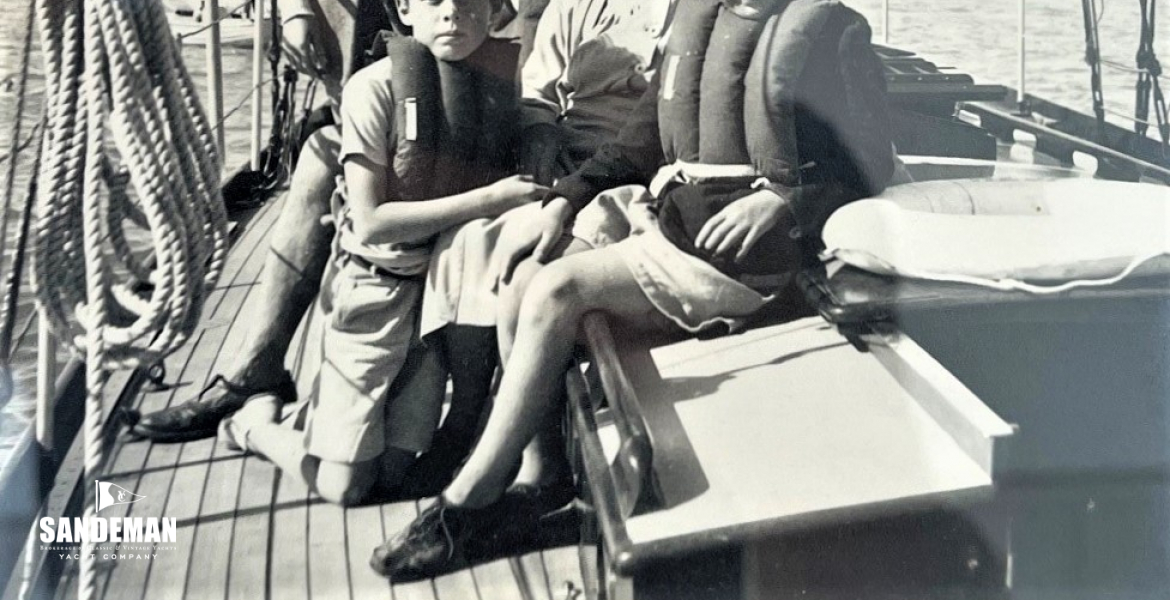 Group Captain J.P. Cecil Wright and a young crew 1950s