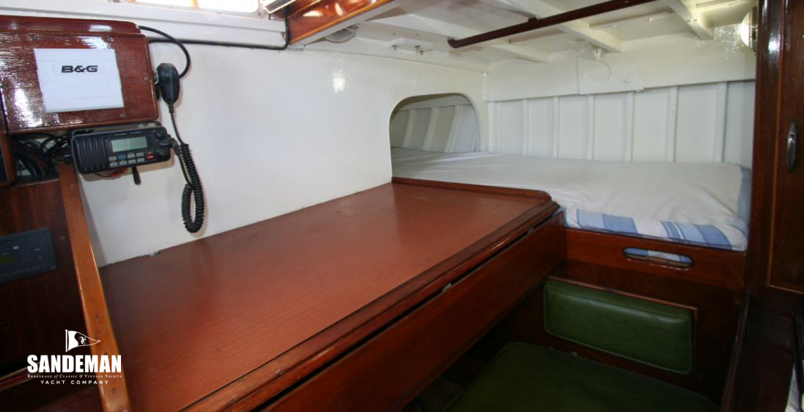 Nav area and single berth to port