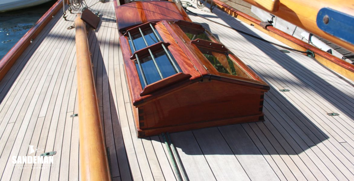 Skylight hatch view aft, gaff stowed on deck