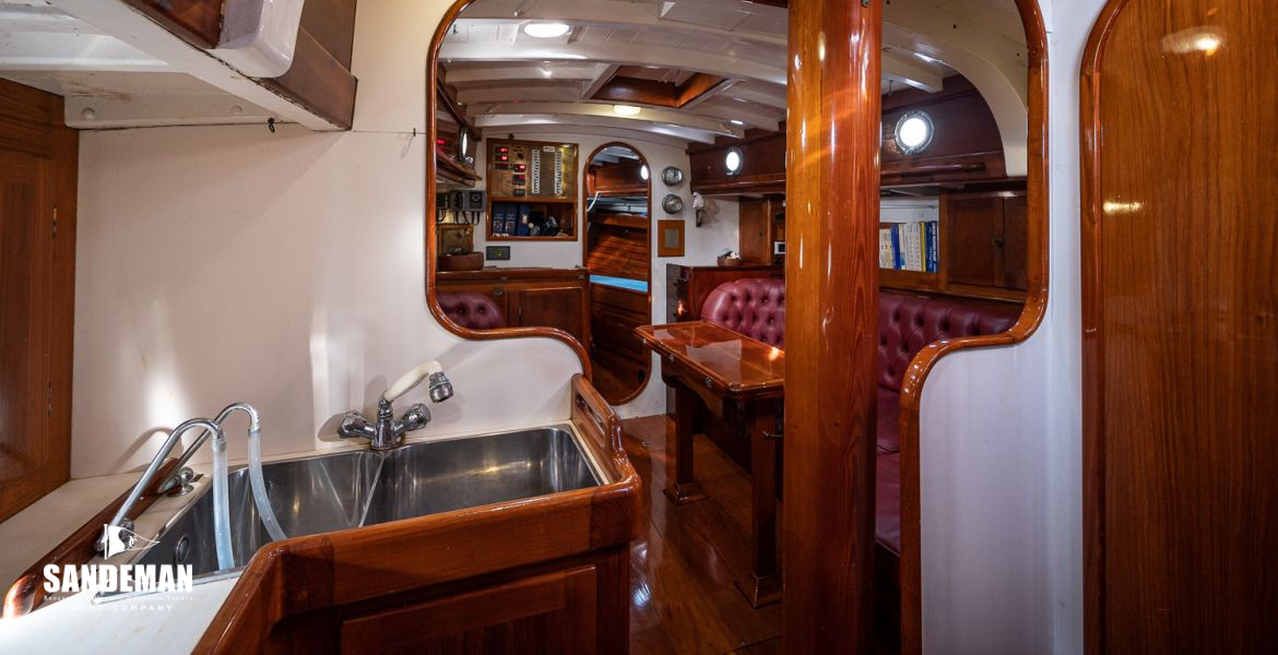 Lobby at foot of companionway: galley port; wc stbd