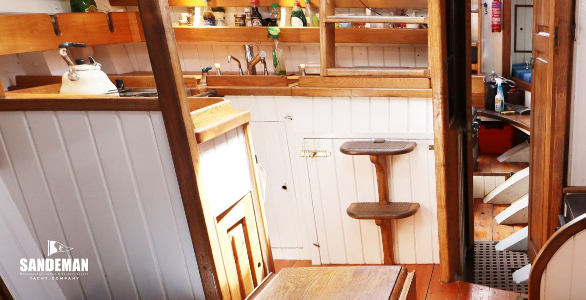 Galley view aft to aft wc and aft pilot cabin