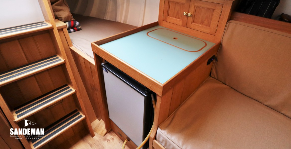 Fridge and quarter berth to port
