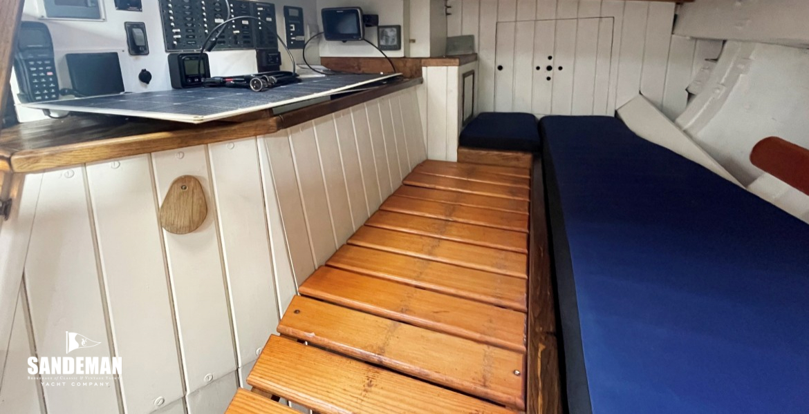 Port quarter cabin as double berth; chart table