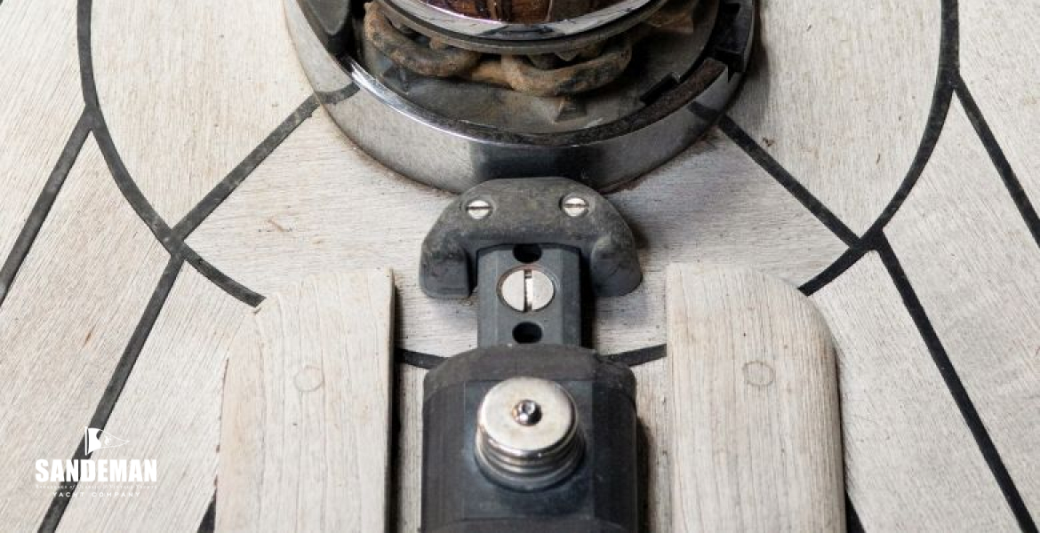 Anchor windlass and foredeck track
