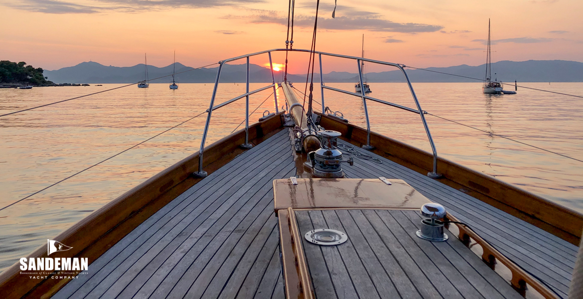 Under the foredeck awning at sunset