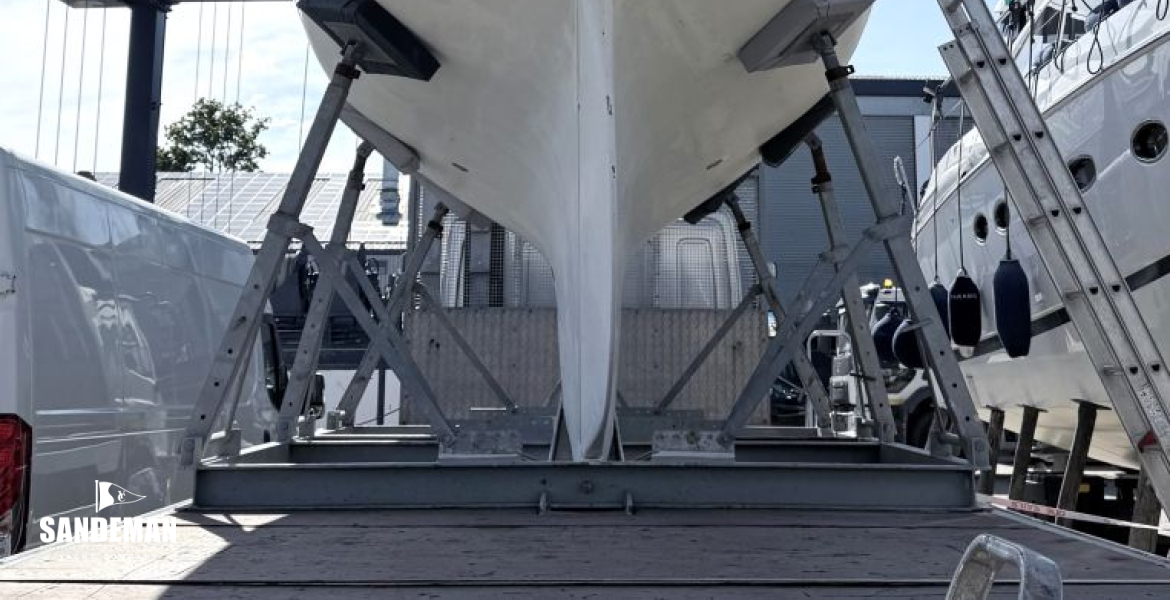 Truck, cradle and boat from aft