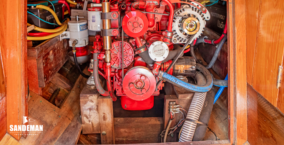 Engine space behind companionway