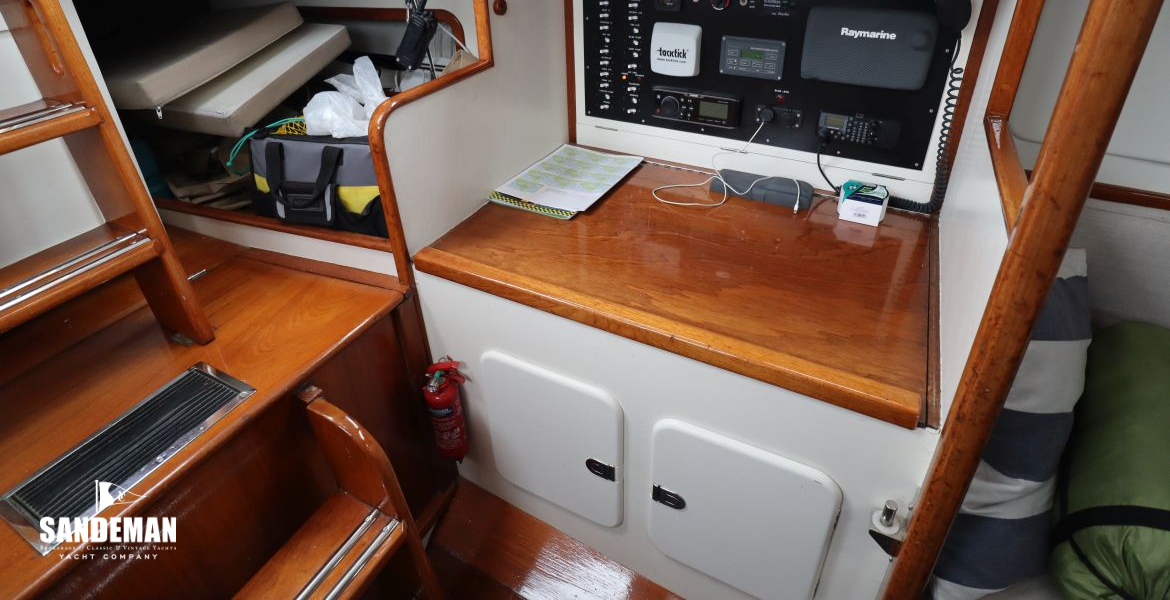 Quarter berth and nav station to port