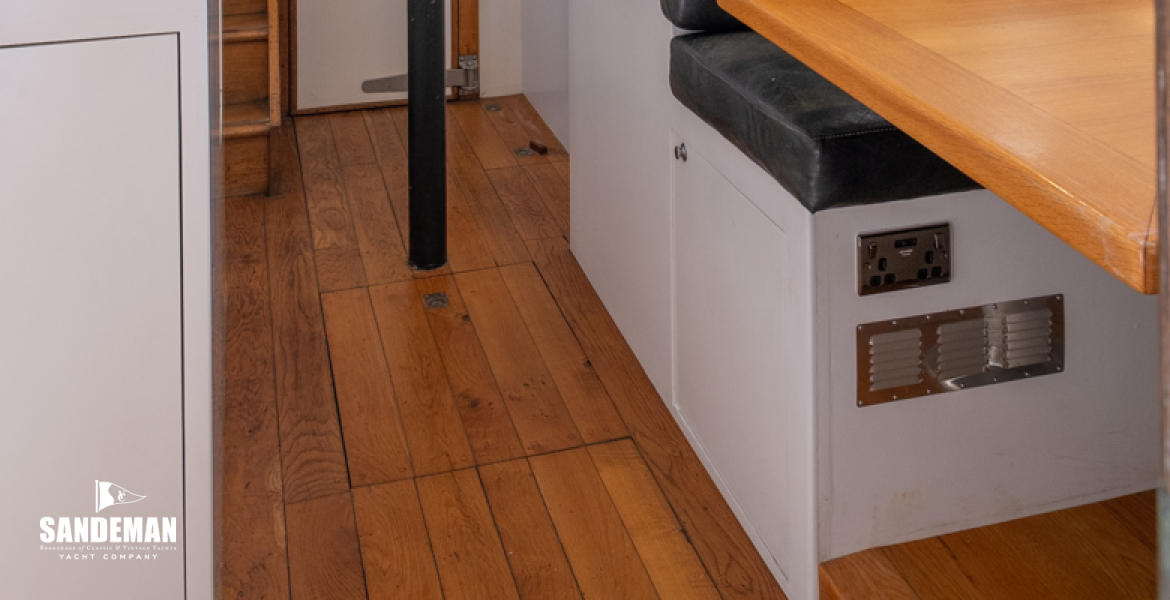 Return aft to galley-dinette