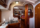 Lobby at foot of companionway: galley port; wc stbd