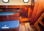Saloon to starboard of companionway - fold away chart table