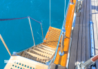 Boarding companionway and swim shower