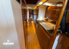 Passage fwd, galley to starboard, WCs to port