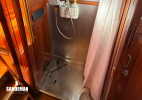 Shower compartment to starboard