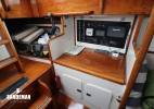Quarter berth and nav station to port