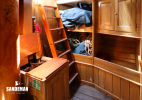 Chain chest; fwd companionway; stowage to port